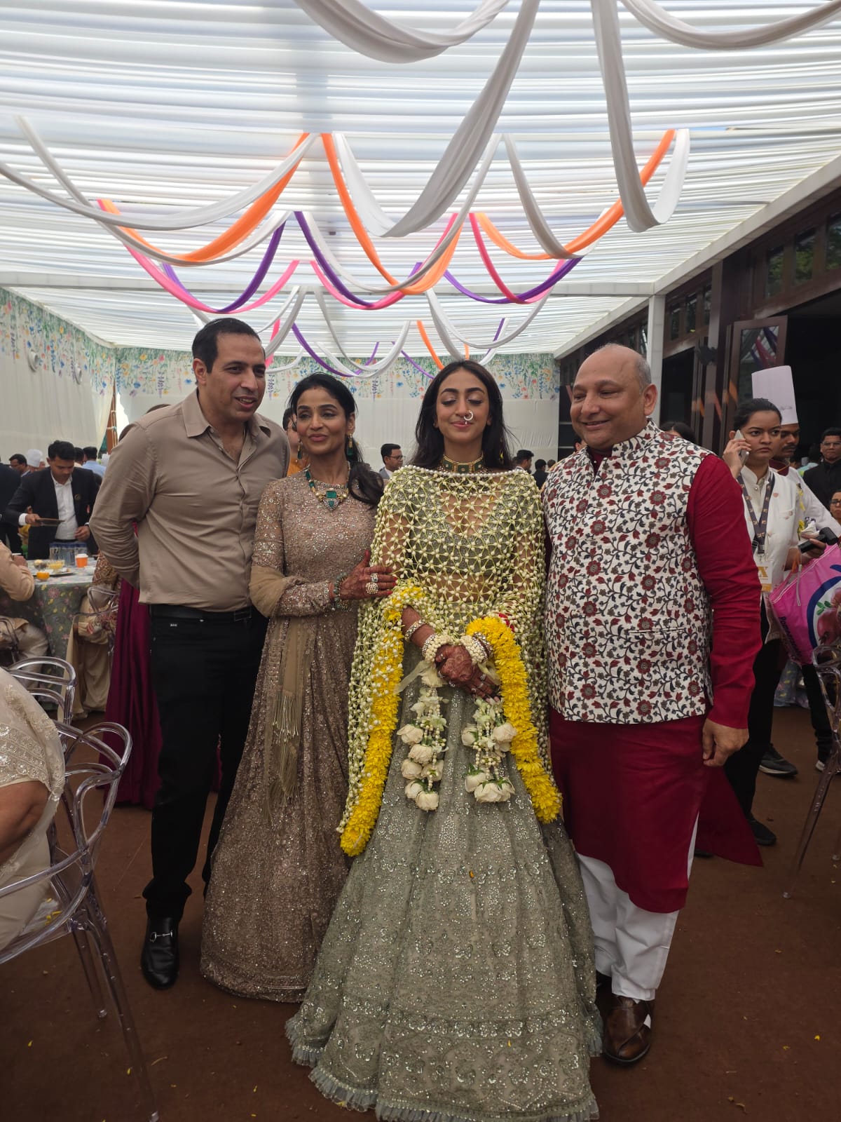Family group photograph with the bride and Mr. Manoj Garg