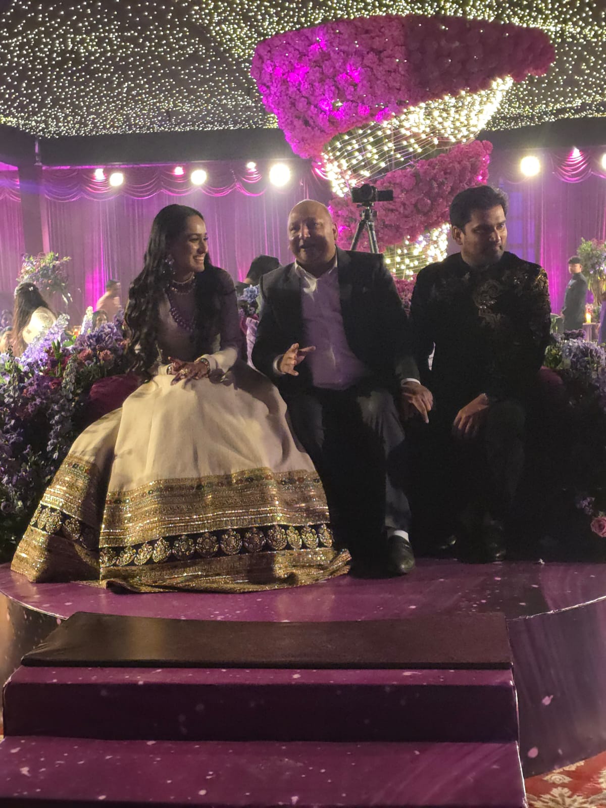 Family seated on the wedding mandap